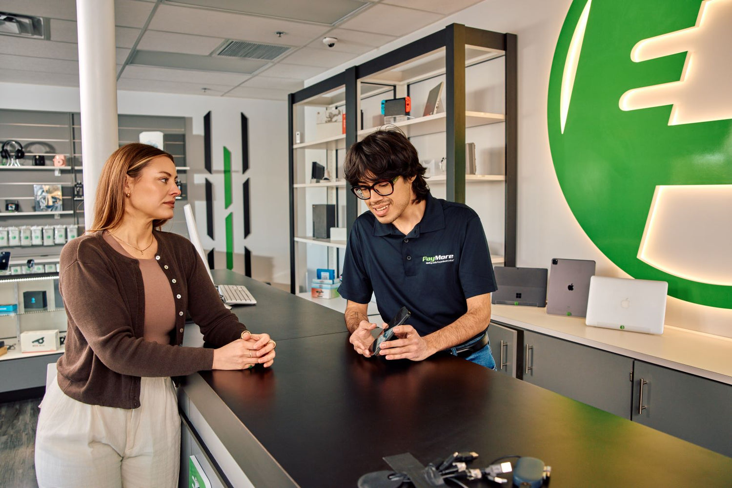 employee inspecting a smartphone