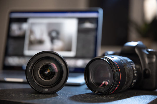 Camera lenses shown for resale evaluation at PayMore Santa Clarita