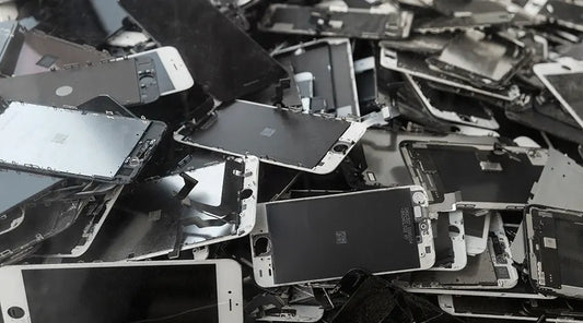 Used smartphones and laptops ready for resale instead of disposal